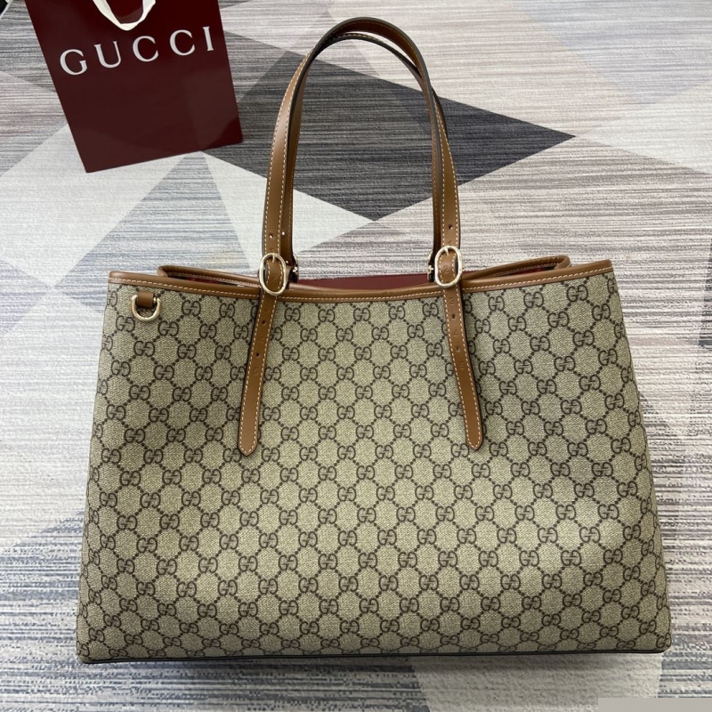 G*u*i shopping bags